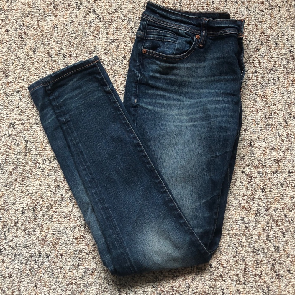 Buckle black skinny jeans